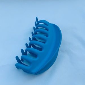 Pastel blue hair claw clip.